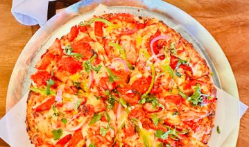 namaste butter chicken pizza